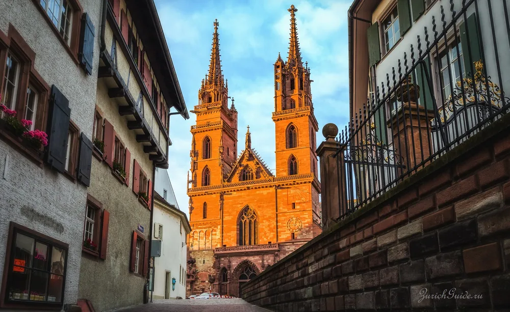 The red sandstone Munster of Basel seen from a lane