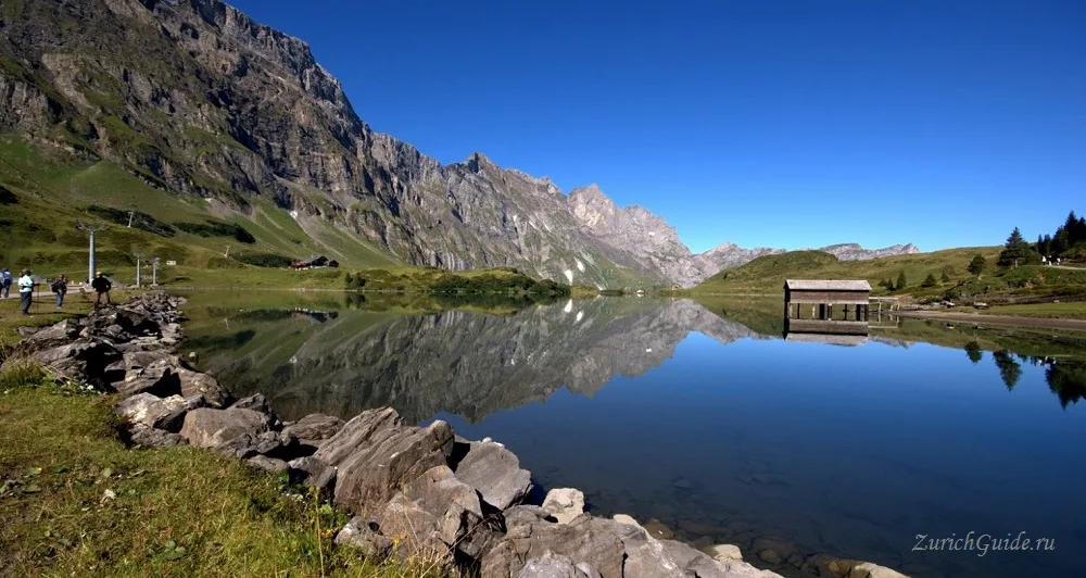 The Trubsee lake above Engelberg with mountains reflected