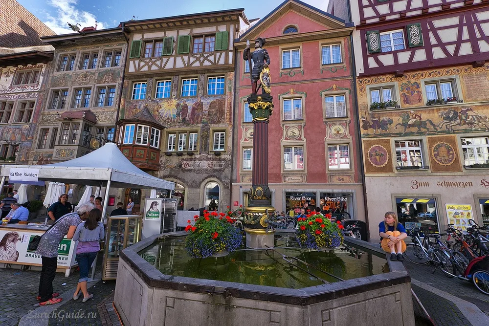 Painted facades and a fountain on the market square of Stein am Rhein